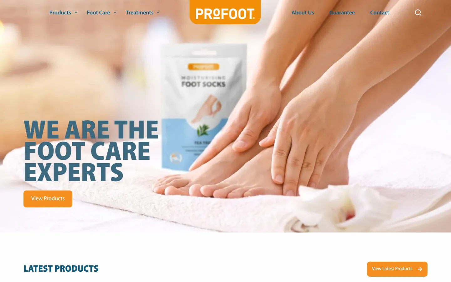 Profoot website home page: the headline We are the foot care experts over a photo of feet and moisturising foot socks, with a View Products button