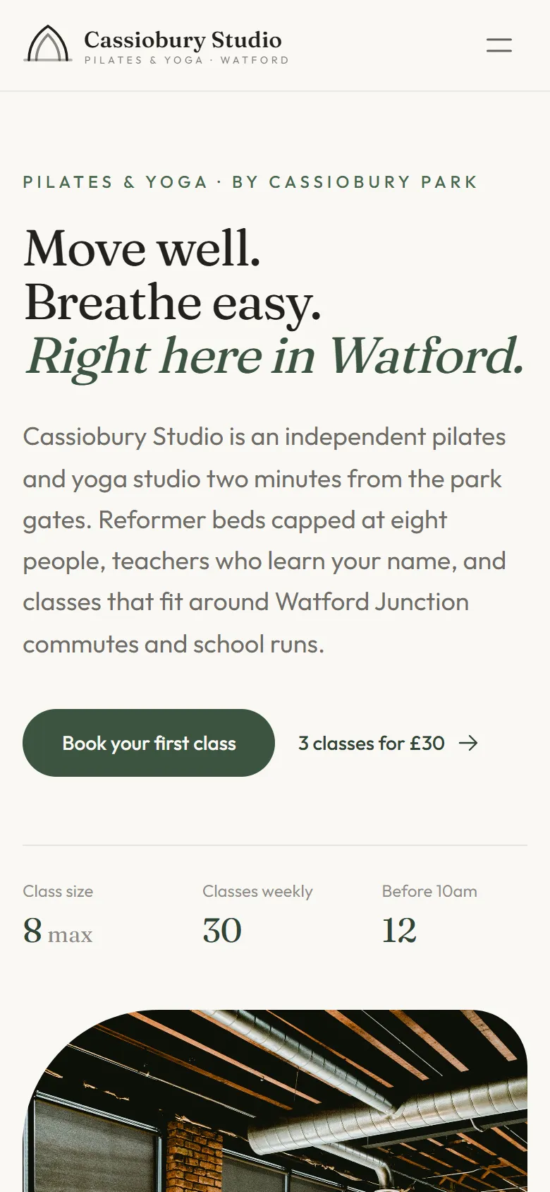 The same demo studio site on a phone, with the headline and Book your first class button