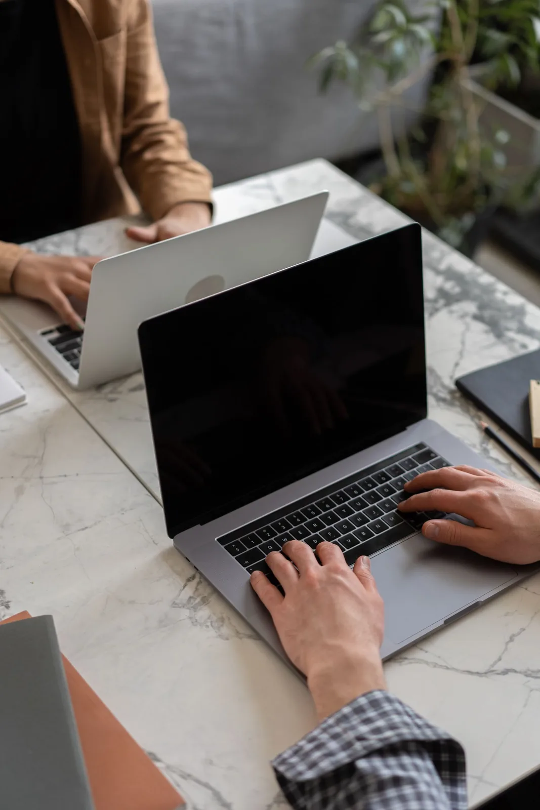 Reviewing a website's AI search visibility on a laptop